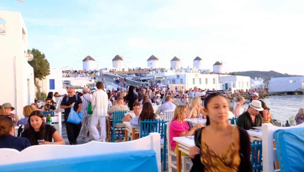 People at the wind mills of Mykonos