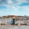 Tourist on Delos island staring at the ruins