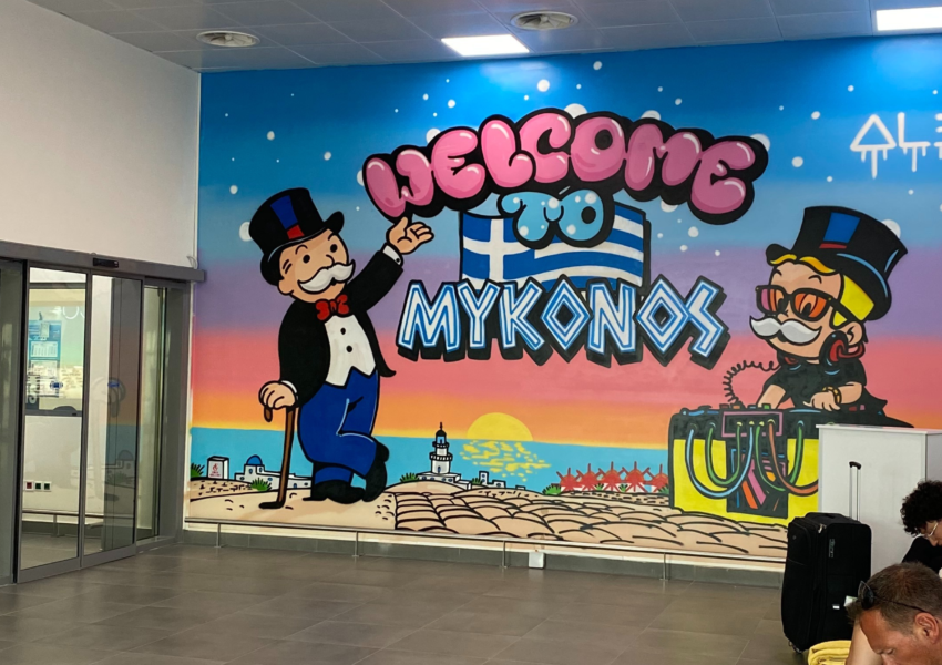 Mykonos airport welcome poster