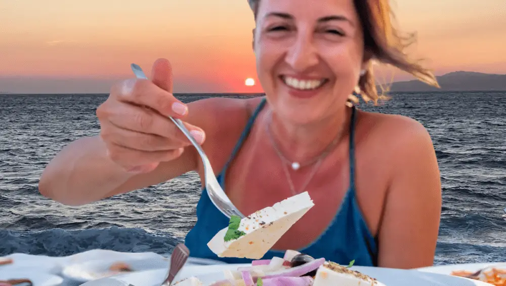 Woman enjoying local greek food.