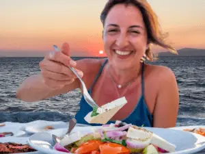 Woman enjoying local greek food.